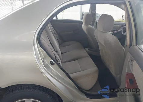 2003 Toyota Corolla Le z USA, uszkodzony, nr VIN JTDBR32EX30047579